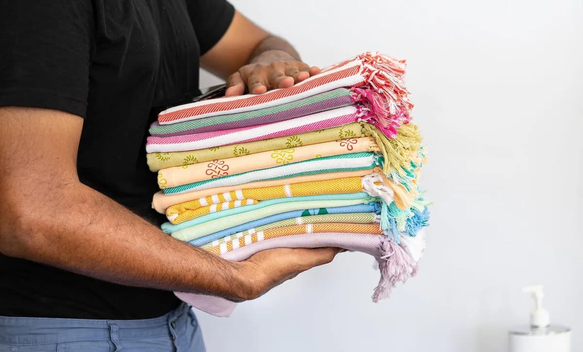 Bags of Airbnb linen ready for collection in Cardiff for professional washing and folding